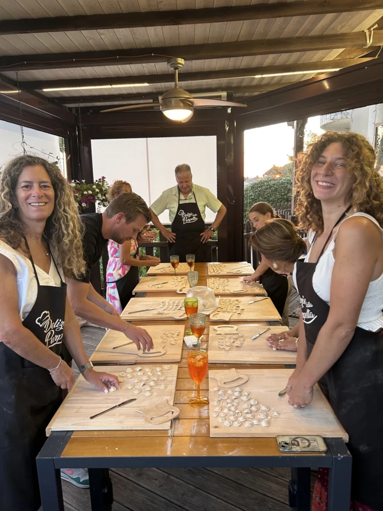 Guests making fresh pasta together