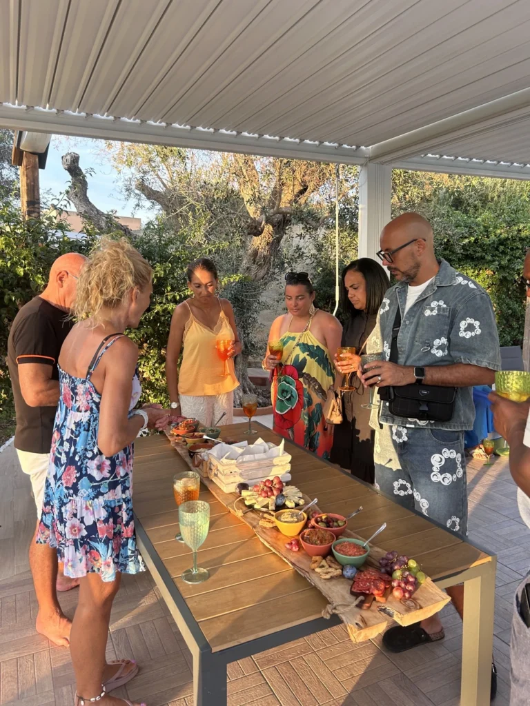 Guests enjoying our aperitivo board around the table