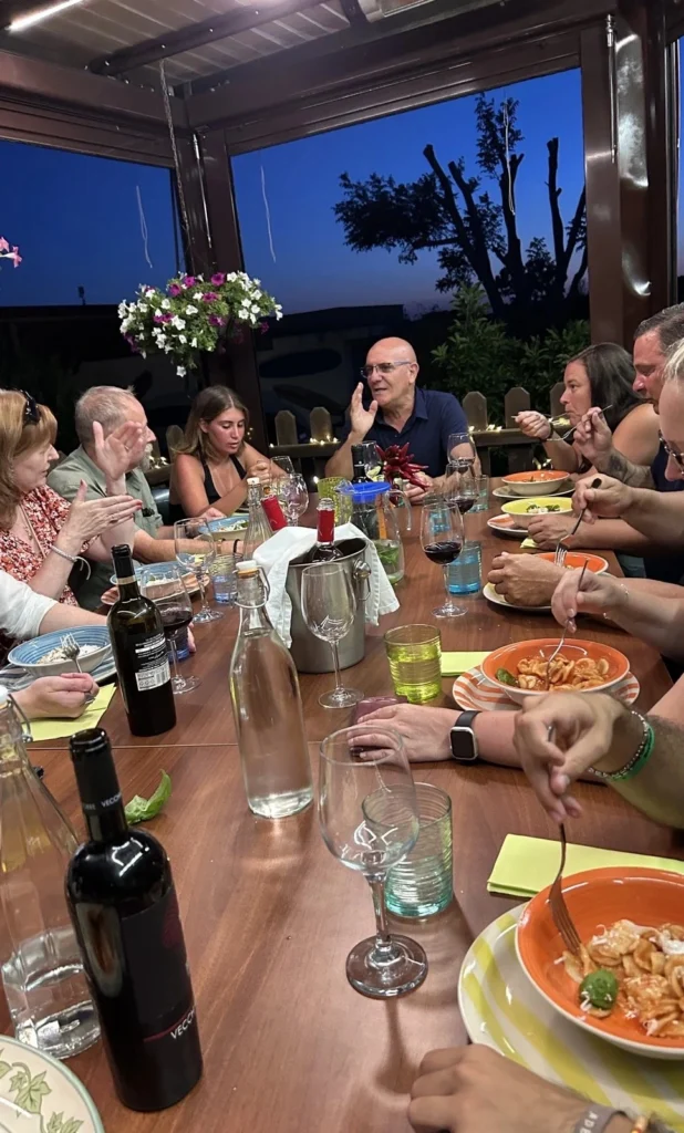 Guests sharing dinner during the cooking experience
