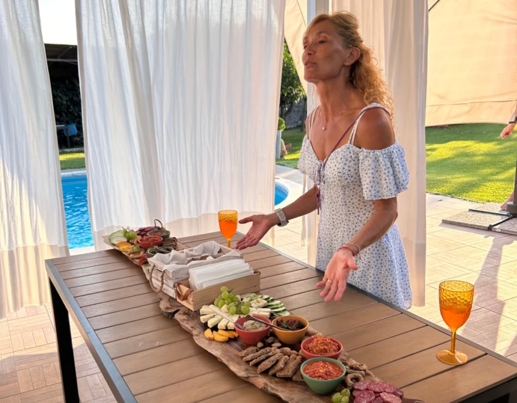 Enza presenting our aperitif board featuring local specialties