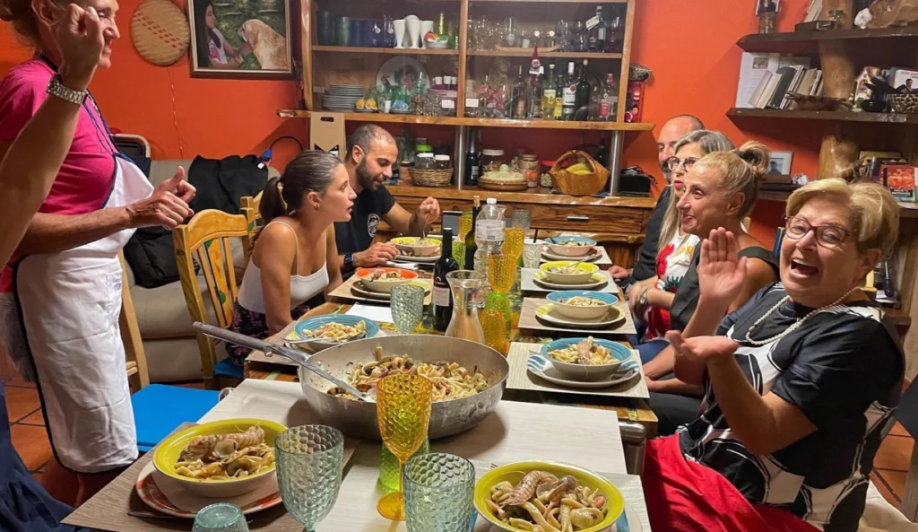 Guests sharing dinner during the cooking experience